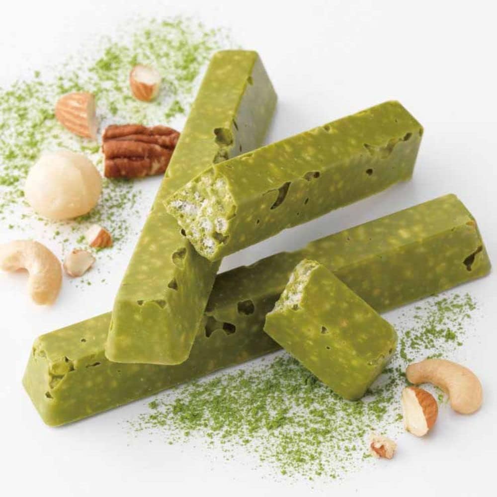 Close-up of ROYCE Matcha Bar Chocolate showing nuts and cookie layers