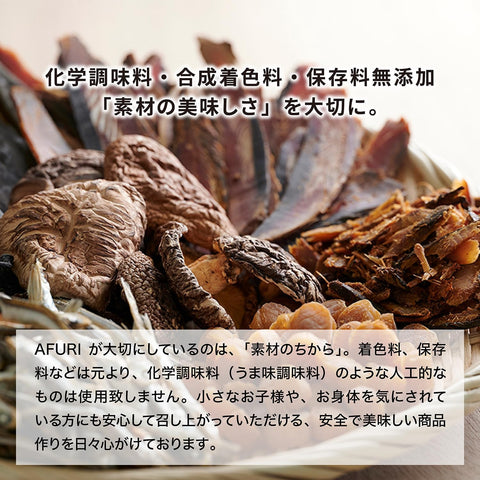 Bowl of AFURI yuzu spicy ramen with chili broth and yuzu peel