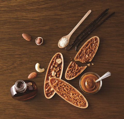 Close-up showing the crispy texture and caramelized nut topping of Akai Boushi Nuttya cookies