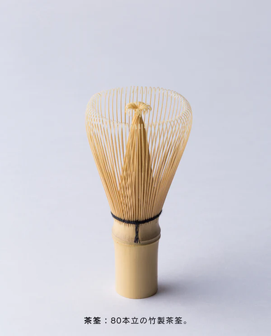 Beginner preparing Japanese matcha with Ippodo bowl whisk and matcha stick