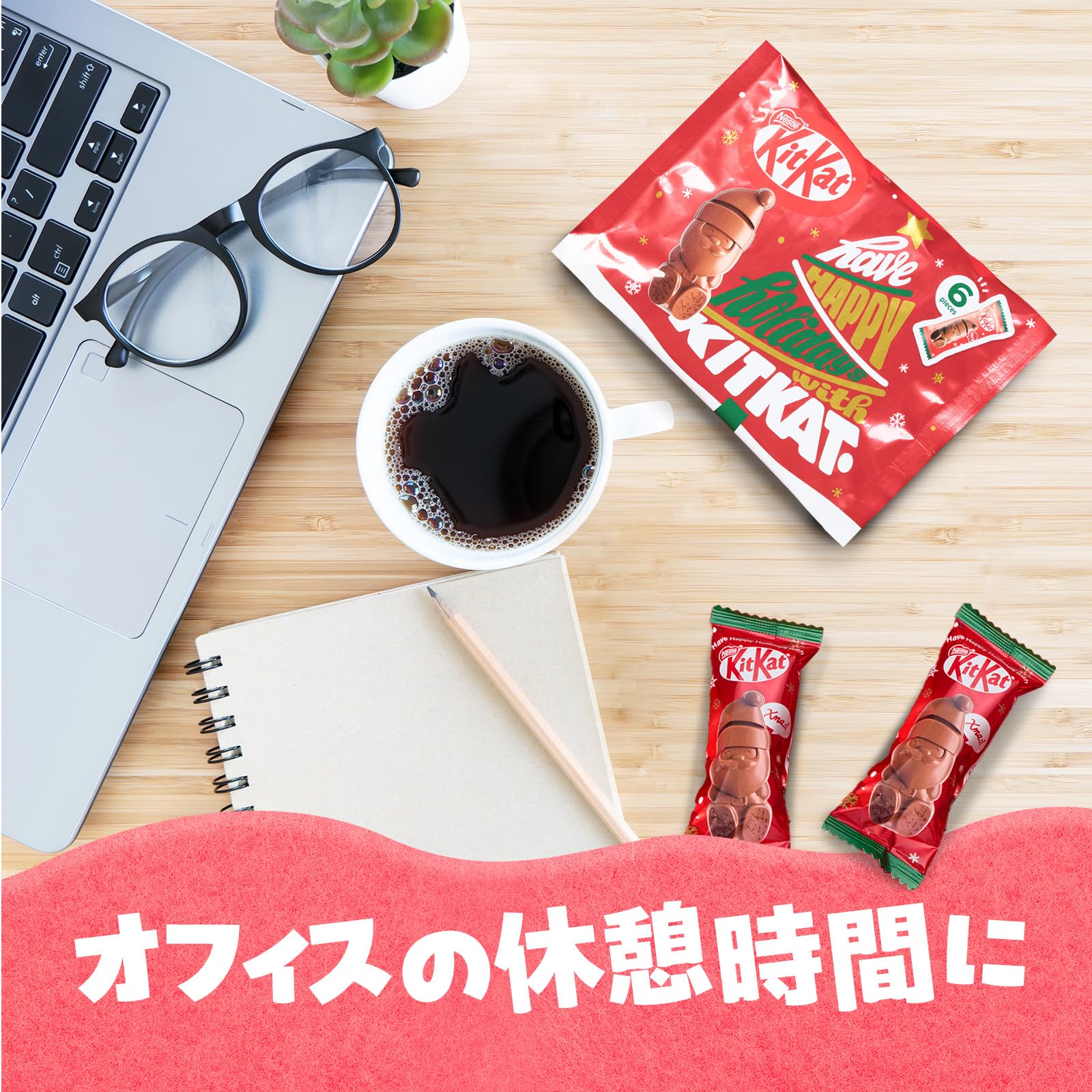 Close-up of individually wrapped KitKat Holiday Santa bars with festive Christmas messages