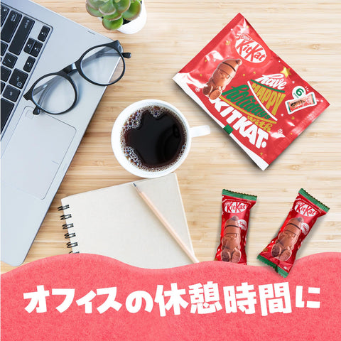 Close-up of individually wrapped KitKat Holiday Santa bars with festive Christmas messages