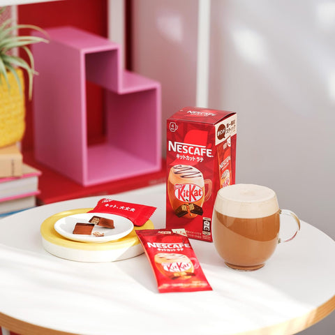 Flat lay of Nescafé KitKat Latte box with all four sticks displayed