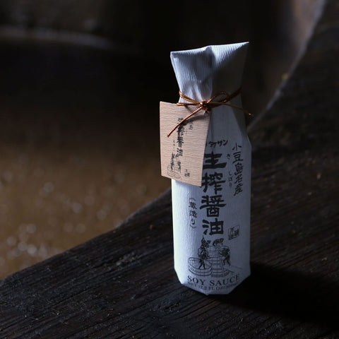 Close-up of wooden-barrel fermented Japanese soy sauce