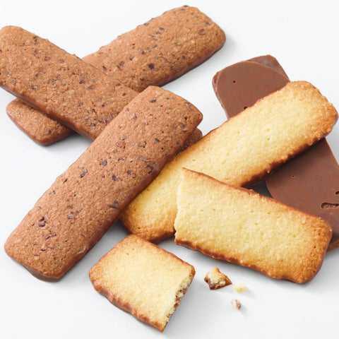 Assorted cookies including chocolate and vanilla on a white background