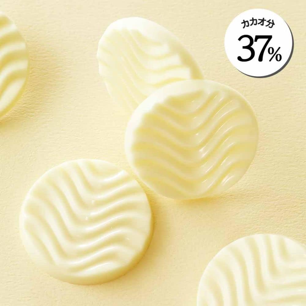 Close-up of ROYCE creamy white chocolate pieces showcasing smooth milky texture