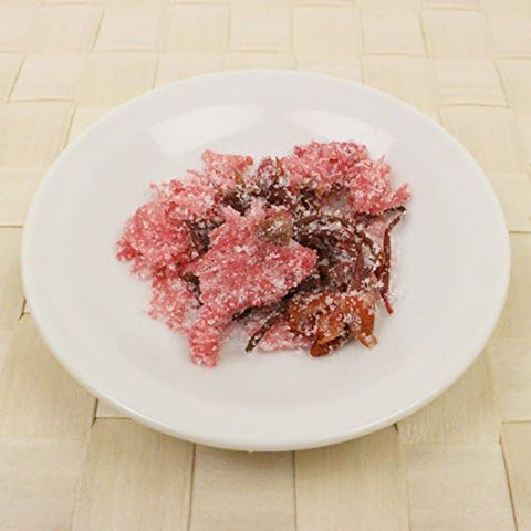 Sakura tea served at Japanese wedding celebration with pink blossoms