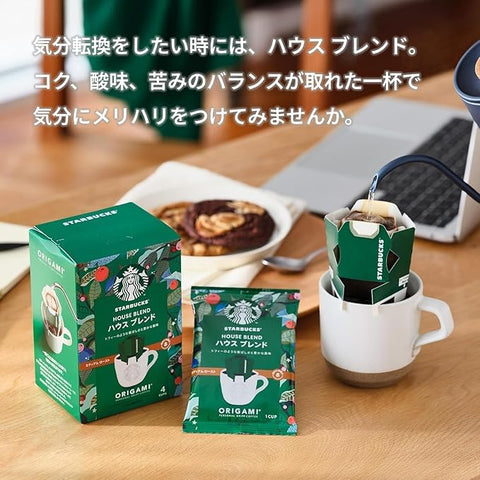 Close-up of Starbucks Origami drip coffee brewing process, showcasing rich aroma and smooth extraction.