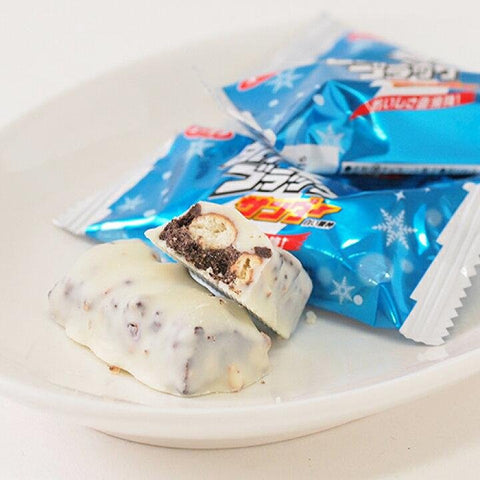 Close-up of White Black Thunder bar showing crunchy cookie and white chocolate coating